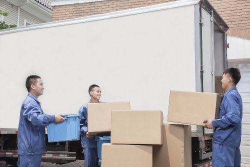 Commercial moving boxes and office furniture prepared for relocation