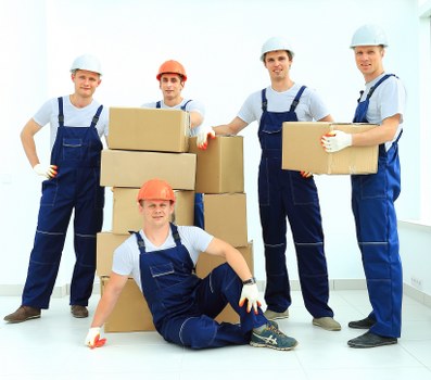 Packed boxes and furniture prepared for transport by a Dagenham removal company
