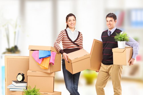 Packed moving boxes and household items ready for transport