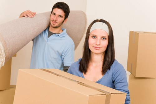 Professional packing team preparing fragile items for transport in Dagenham