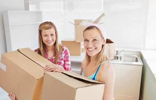 Local removals crew handling furniture move in Dagenham