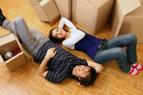 Office furniture and equipment being prepared for a commercial move