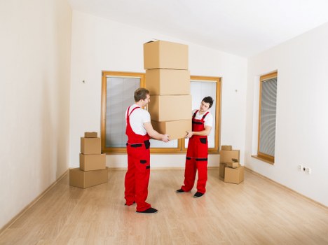 Unpacking service setting up a family kitchen after a move in Dagenham
